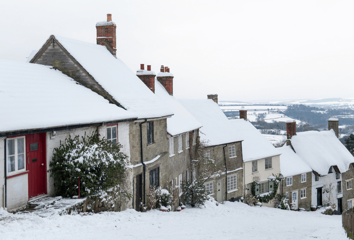 snow covered houses in Dorset