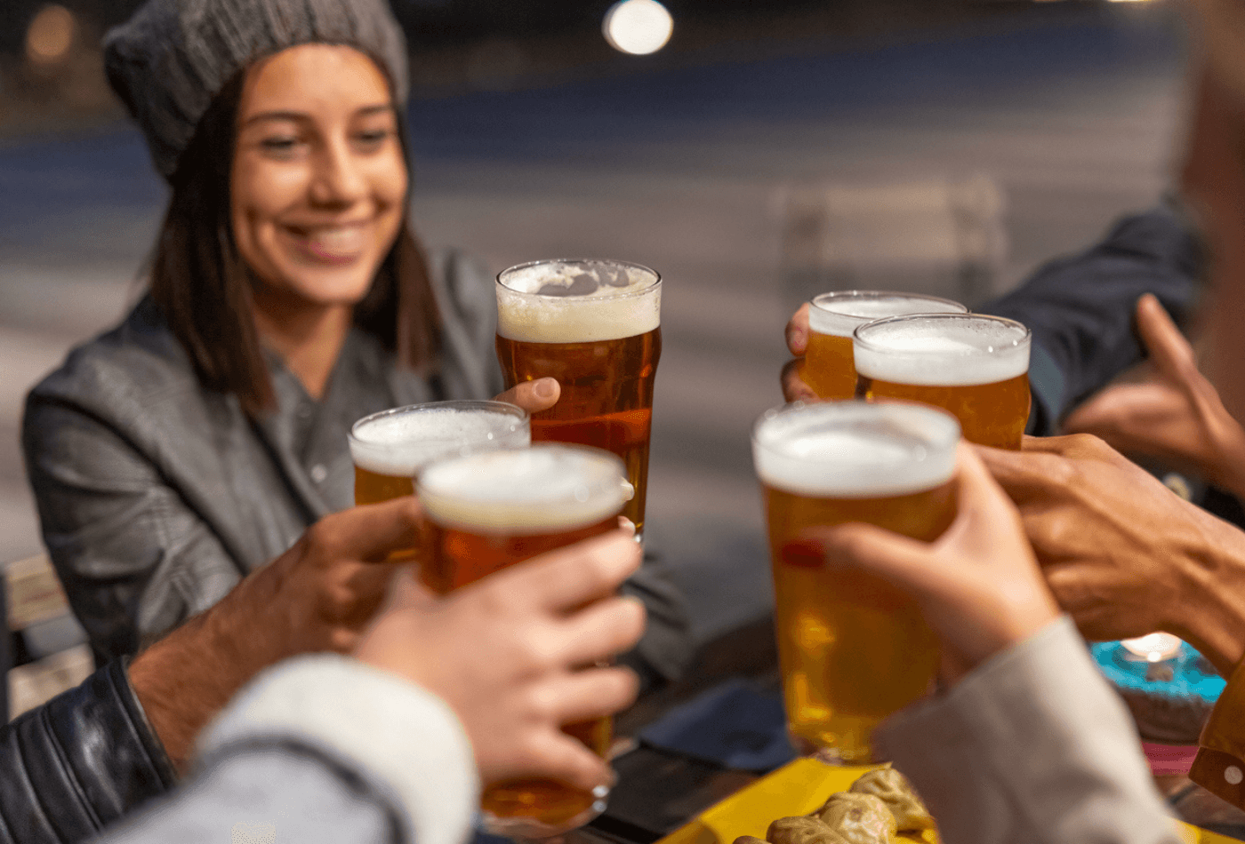 People drinking beer in pub