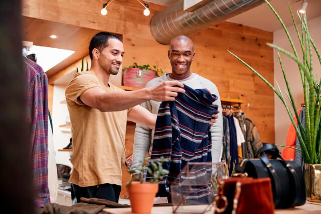 Young men shopping