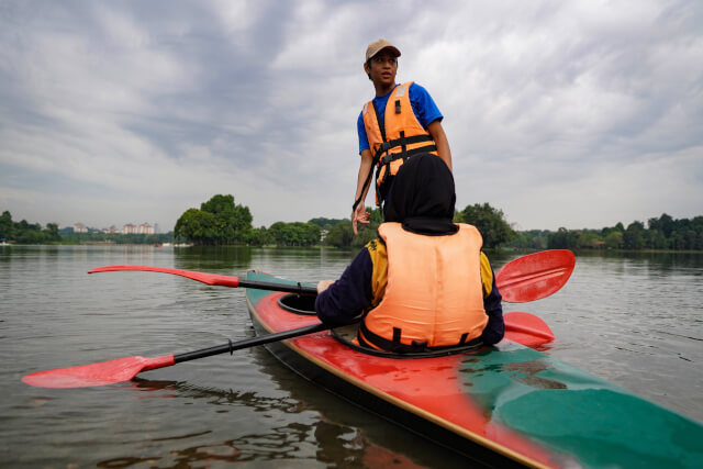 young kids in kayak