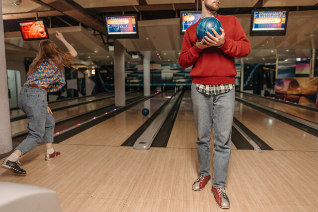 Action image of girl bowling